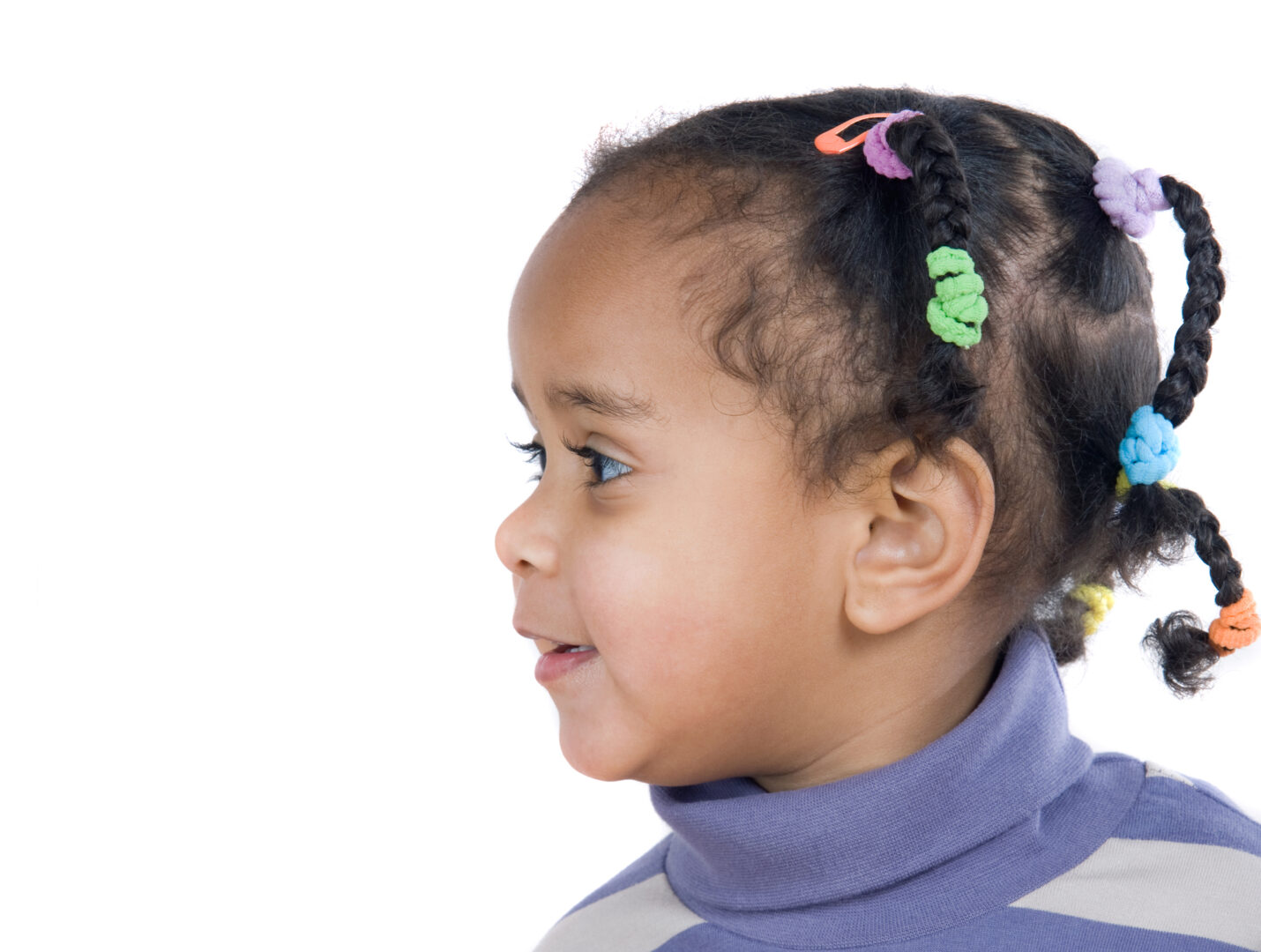 Profile of adorable african baby on a over white background